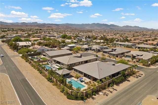 7477 Triple Knot Ct, Las Vegas, NV 89113 - aerial view of residential area featuring a pool area and mountains
