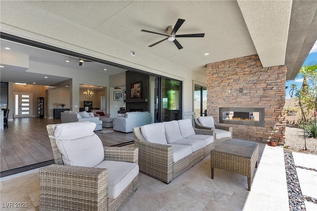7477 Triple Knot Ct, Las Vegas, NV 89113 - view of patio featuring an outdoor living space with a fireplace and a ceiling fan