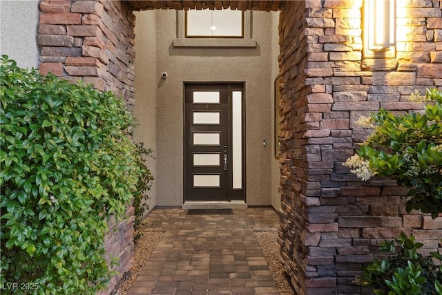 7477 Triple Knot Ct, Las Vegas, NV 89113 - view of exterior entry with stucco siding