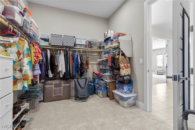 7477 Triple Knot Ct, Las Vegas, NV 89113 - spacious closet with carpet floors and tile patterned floors