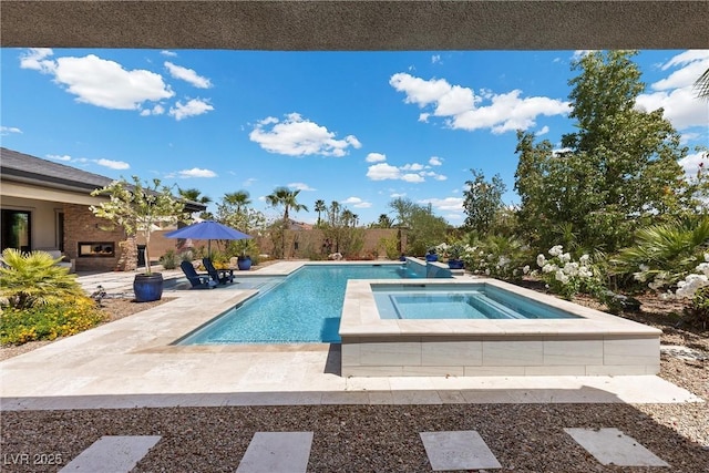 7477 Triple Knot Ct, Las Vegas, NV 89113 - outdoor pool featuring an in-ground hot tub and a patio area