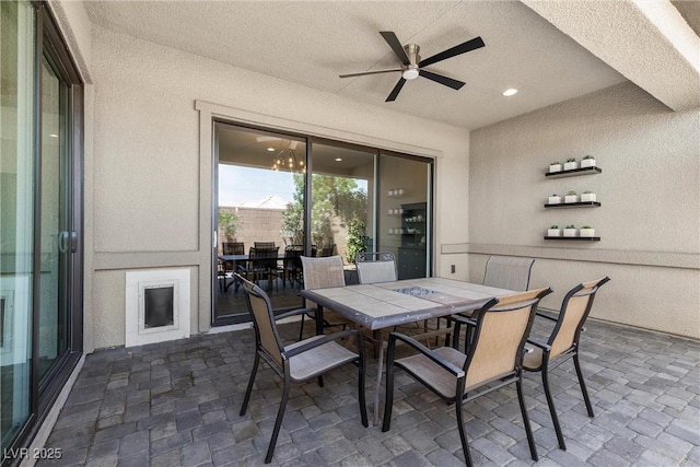 7477 Triple Knot Ct, Las Vegas, NV 89113 - view of patio with outdoor dining area and a ceiling fan