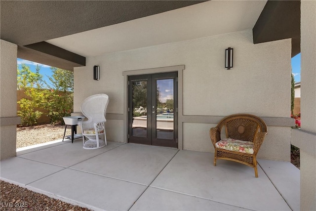 7477 Triple Knot Ct, Las Vegas, NV 89113 - view of patio / terrace featuring french doors