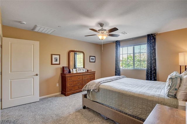 bedroom featuring carpet, a ceiling fan, and baseboards