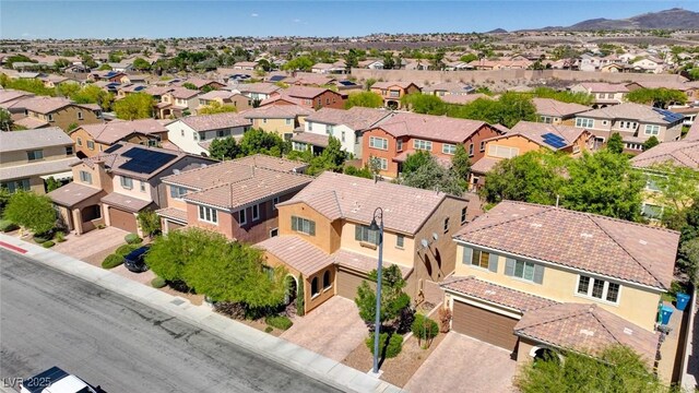 aerial view of residential area with a mountain backdrop
