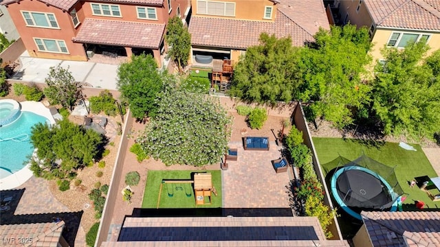 aerial view of residential area featuring a pool area