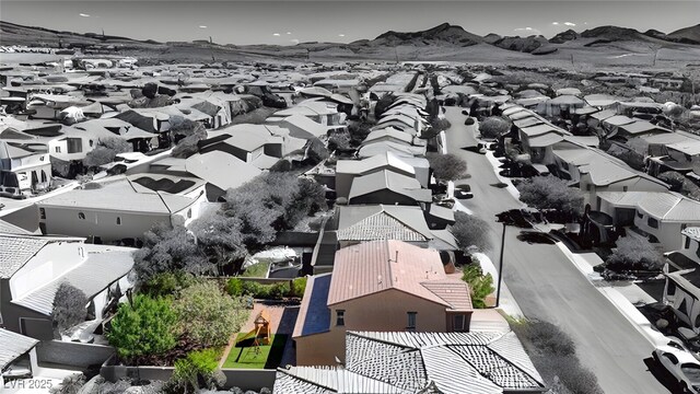 aerial view of residential area with a mountain backdrop