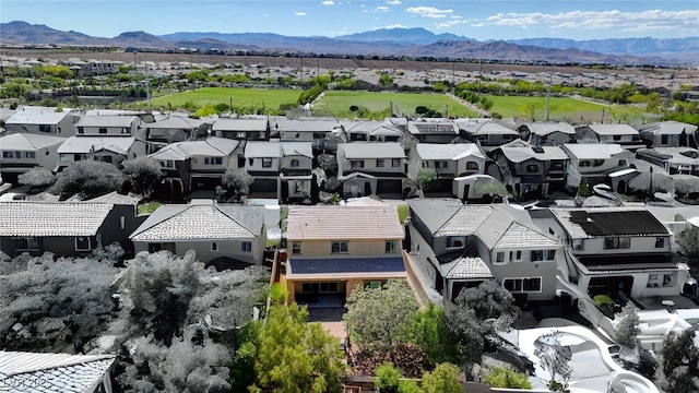 aerial perspective of suburban area with a mountain backdrop