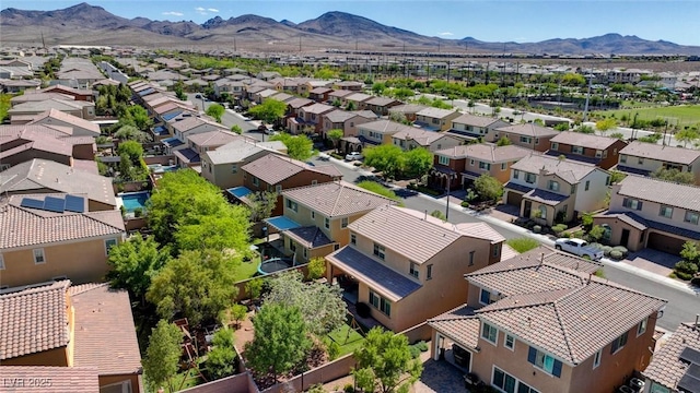 aerial perspective of suburban area featuring mountains