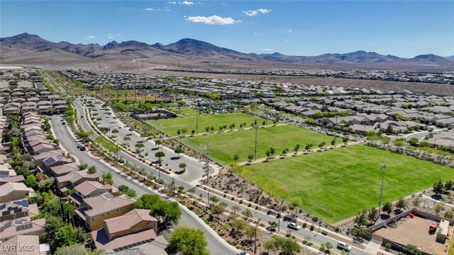 aerial view of residential area with a mountainous background