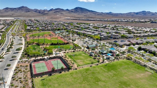 aerial view of residential area with a mountainous background