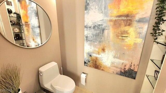 bathroom featuring toilet