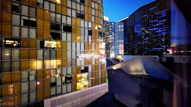 balcony at night with a view of city lights