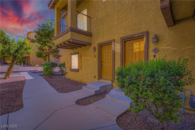 5915 Nuevo Leon St Unit 8, North Las Vegas, NV 89031 - entrance to property with stucco siding and a balcony