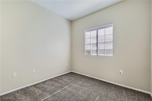 5915 Nuevo Leon St Unit 8, North Las Vegas, NV 89031 - spare room featuring carpet and baseboards