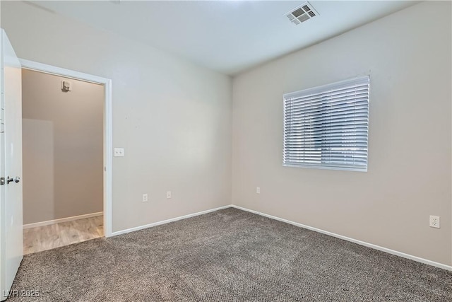 5915 Nuevo Leon St Unit 8, North Las Vegas, NV 89031 - carpeted empty room featuring baseboards