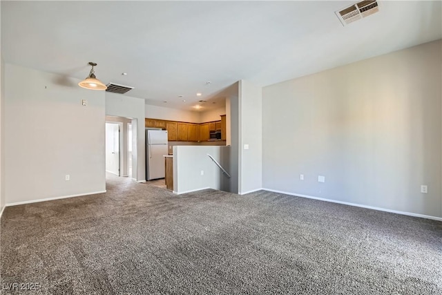 5915 Nuevo Leon St Unit 8, North Las Vegas, NV 89031 - unfurnished living room with light colored carpet and baseboards