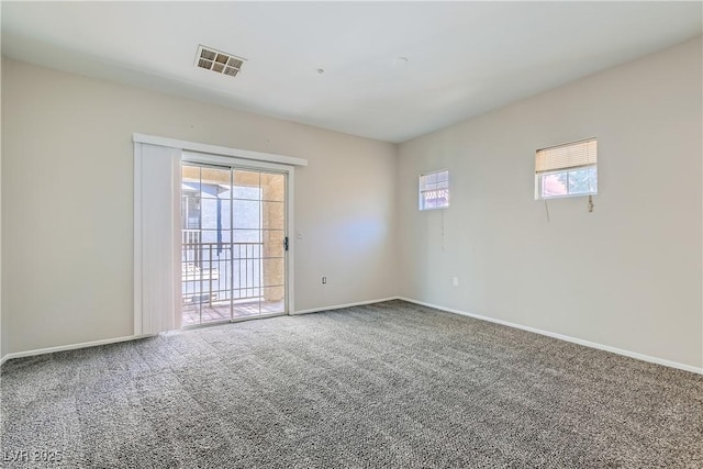 5915 Nuevo Leon St Unit 8, North Las Vegas, NV 89031 - carpeted spare room with baseboards