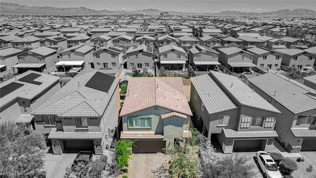 aerial view of residential area with a mountain backdrop