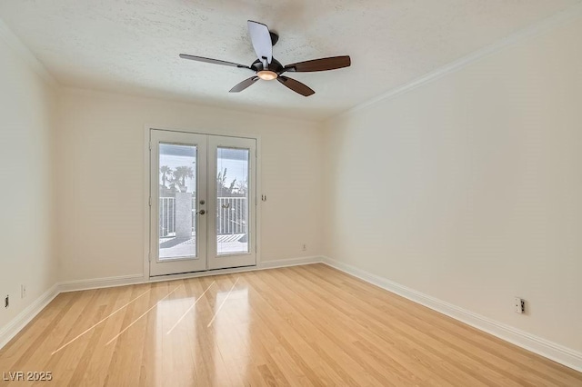 4302 Newhaven Dr, Las Vegas, NV 89147 - empty room with light wood-style flooring, french doors, baseboards, ceiling fan, and crown molding