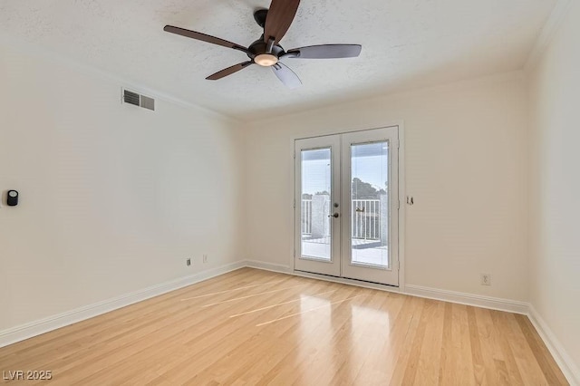 4302 Newhaven Dr, Las Vegas, NV 89147 - spare room featuring french doors, light wood-type flooring, ceiling fan, baseboards, and crown molding