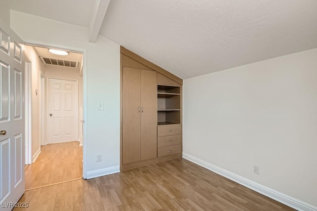4302 Newhaven Dr, Las Vegas, NV 89147 - unfurnished bedroom with light wood-type flooring, baseboards, and a closet