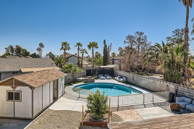 4302 Newhaven Dr, Las Vegas, NV 89147 - view of pool with a fenced backyard, a patio area, and a fire pit