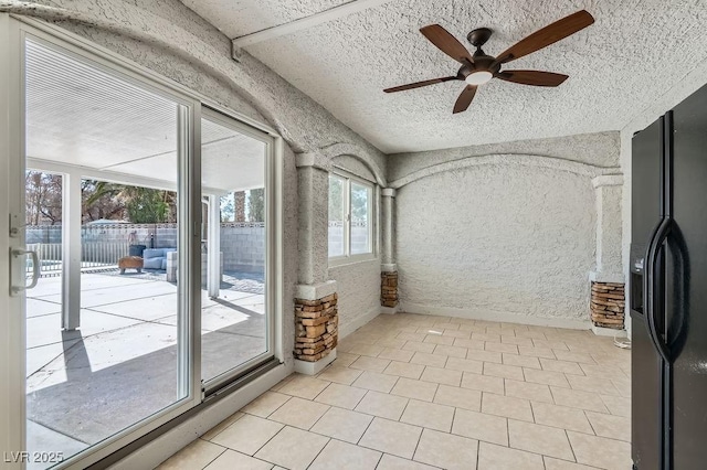 4302 Newhaven Dr, Las Vegas, NV 89147 - unfurnished sunroom featuring a textured ceiling