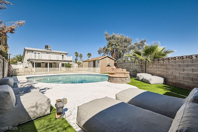4302 Newhaven Dr, Las Vegas, NV 89147 - view of swimming pool with an outdoor structure, a fenced backyard, and a patio