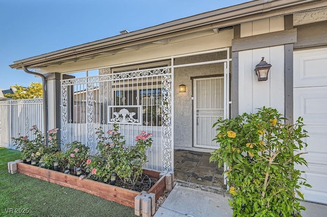 4302 Newhaven Dr, Las Vegas, NV 89147 - doorway to property featuring fence and covered porch