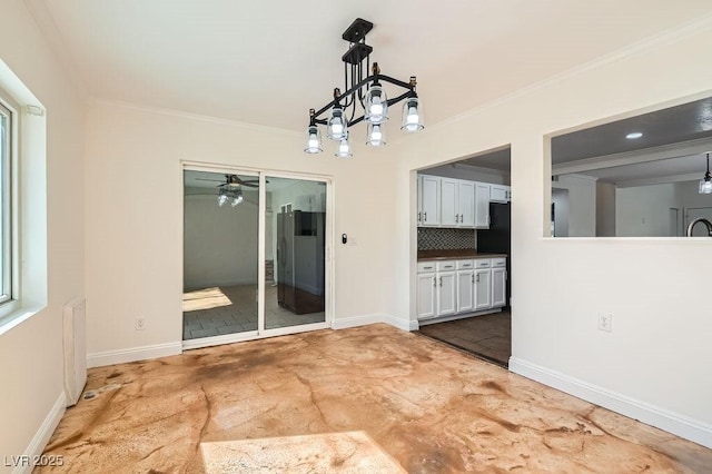 4302 Newhaven Dr, Las Vegas, NV 89147 - unfurnished dining area featuring ornamental molding, ceiling fan, concrete floors, and baseboards