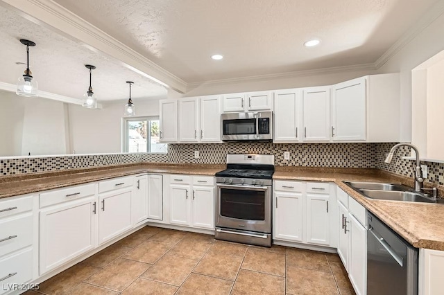 4302 Newhaven Dr, Las Vegas, NV 89147 - kitchen with appliances with stainless steel finishes, a sink, crown molding, backsplash, and white cabinets
