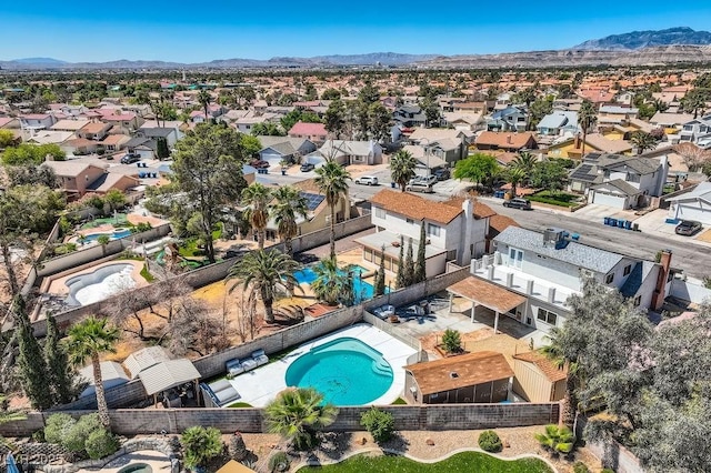 4302 Newhaven Dr, Las Vegas, NV 89147 - aerial view of residential area featuring a pool and a mountain backdrop