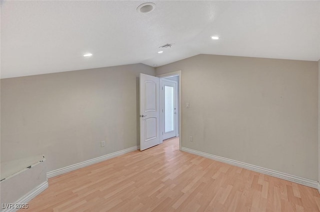 1420 Logandale Dr, Logandale, NV 89021 - additional living space with lofted ceiling, light wood-type flooring, baseboards, and recessed lighting
