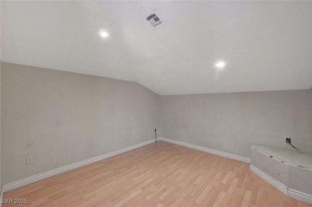 1420 Logandale Dr, Logandale, NV 89021 - bonus room with light wood finished floors, baseboards, vaulted ceiling, and recessed lighting