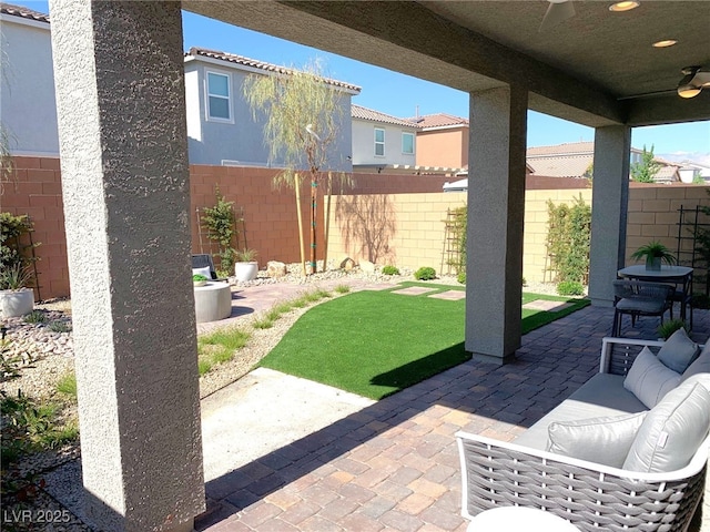 6511 Dove Point Pl, Las Vegas, NV 89130 - view of patio featuring a ceiling fan and a fenced backyard