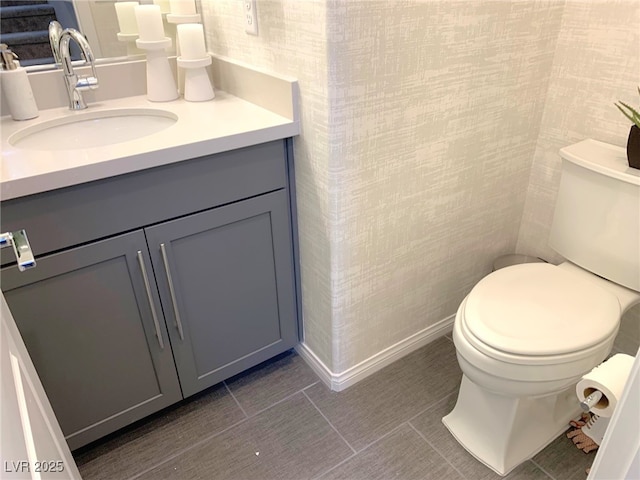 6511 Dove Point Pl, Las Vegas, NV 89130 - bathroom featuring toilet, vanity, and tile patterned flooring