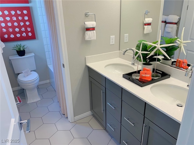 6511 Dove Point Pl, Las Vegas, NV 89130 - full bath featuring double vanity, toilet, and tile patterned floors