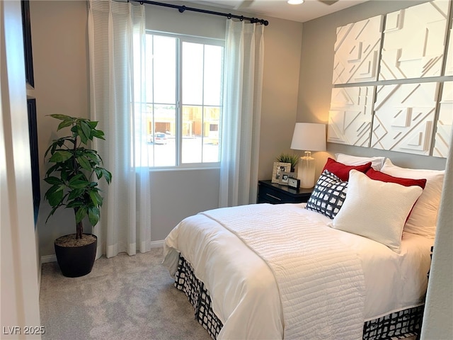 6511 Dove Point Pl, Las Vegas, NV 89130 - bedroom featuring multiple windows, carpet, and baseboards