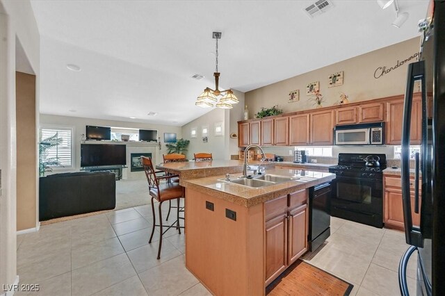 8208 Flowing Rapids Ct, Las Vegas, NV 89131 - kitchen featuring black appliances, a sink, open floor plan, light tile patterned flooring, and lofted ceiling