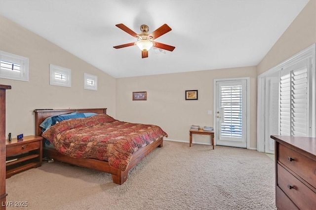 8208 Flowing Rapids Ct, Las Vegas, NV 89131 - bedroom with vaulted ceiling, carpet floors, baseboards, ceiling fan, and access to exterior