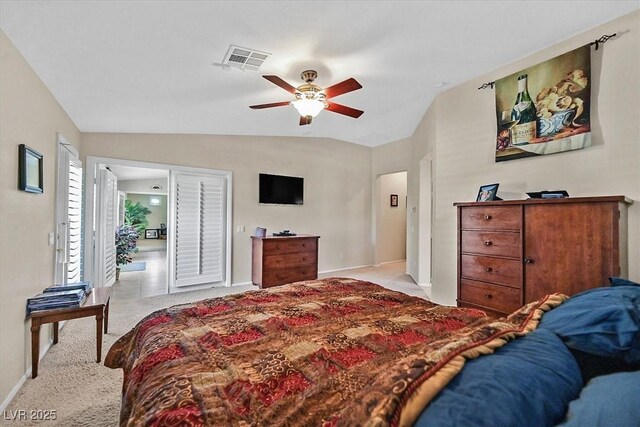 8208 Flowing Rapids Ct, Las Vegas, NV 89131 - bedroom featuring light colored carpet, lofted ceiling, baseboards, and ceiling fan