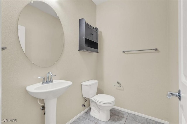 3638 Via Messina, Henderson, NV 89052 - bathroom featuring tile patterned flooring, toilet, and baseboards