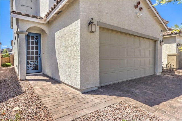 garage featuring driveway