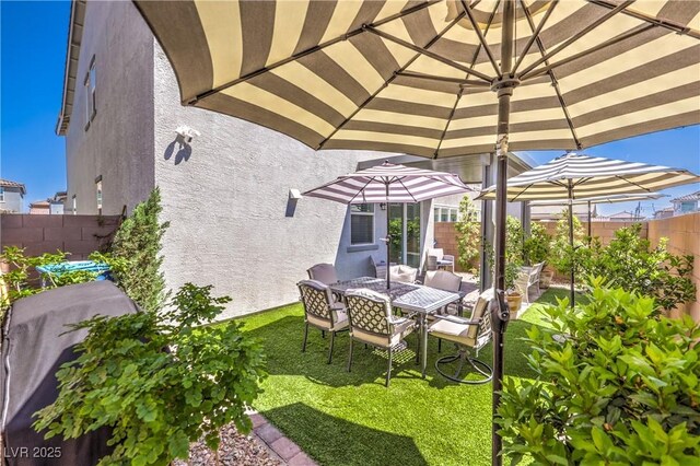view of patio with outdoor dining area