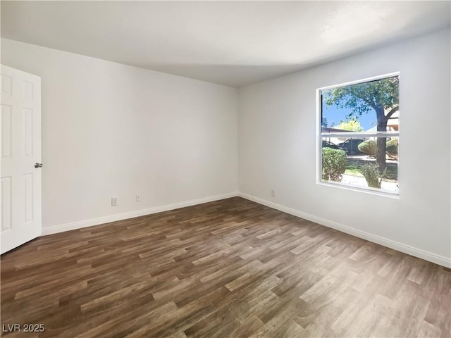 3135 S Mojave Rd Unit 152, Las Vegas, NV 89121 - empty room with dark wood finished floors and baseboards