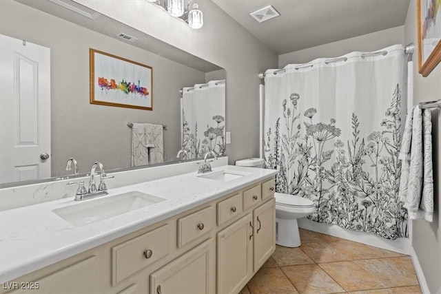 5421 Tourmaline St, Las Vegas, NV 89130 - bathroom with toilet, double vanity, and curtained shower