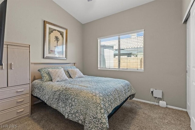 5421 Tourmaline St, Las Vegas, NV 89130 - bedroom featuring dark colored carpet, baseboards, and lofted ceiling