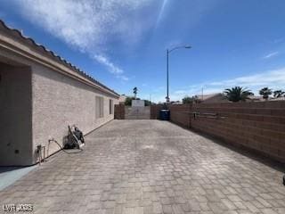 5421 Tourmaline St, Las Vegas, NV 89130 - view of home's exterior featuring fence