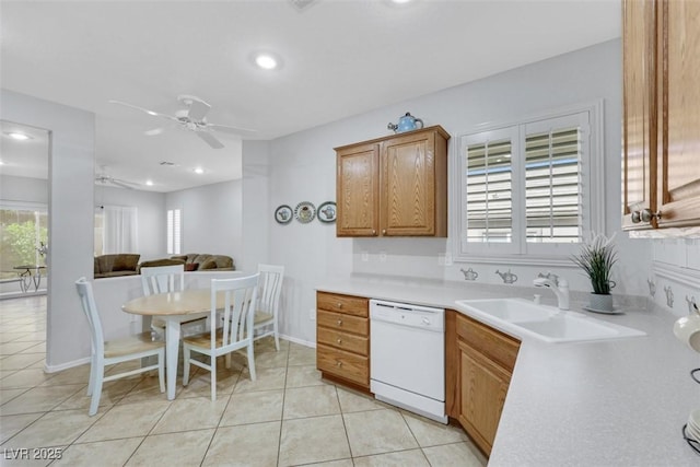 kitchen with dishwasher, a ceiling fan, a sink, recessed lighting, and light tile patterned flooring